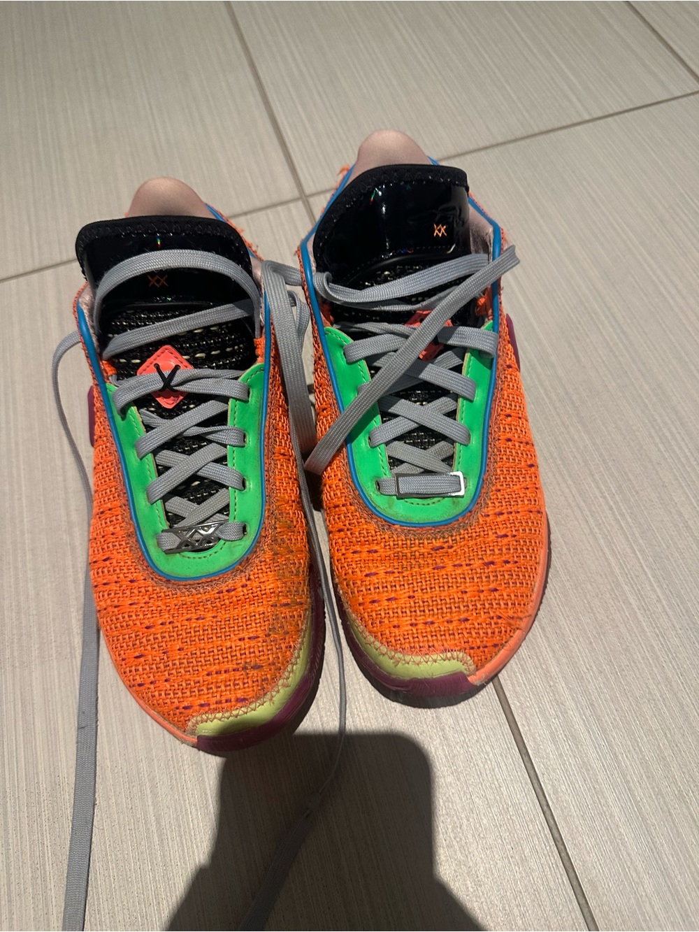 Vibrant Orange Knit Sneakers with Green Accents lebron